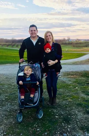A family outing with the stroller in tow.