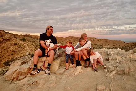 A desert hike with the whole crew, including the dog.